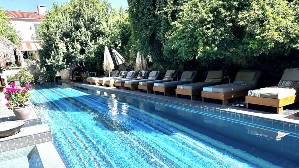 Pool view at Alavya hotel in Alacati, Turkiye, Beach at Momo Beach club in Alacati, Photo by Christine Sarkis
