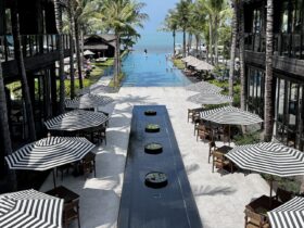 looking out over pool and to the beach in Koi Samui Thailand at the Kimpton