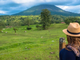 Woman standing in a lush field in Costa Rica