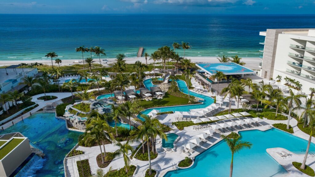 An aerial view of the pools and beach at The St. Regis Longboat Key