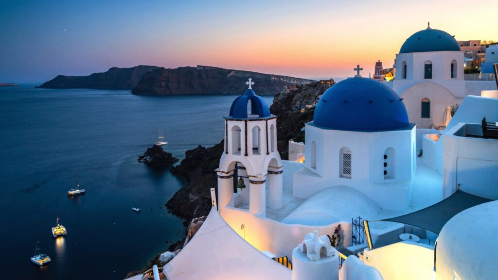 Sunset over the blue rooftops of Greece