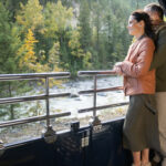 Couple standing on a train platform