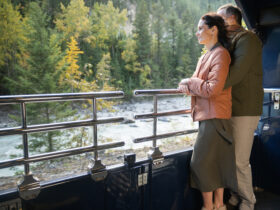 Couple standing on a train platform