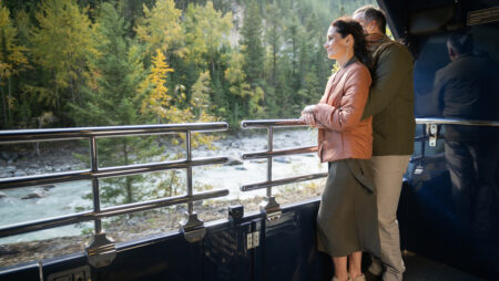 Couple standing on a train platform