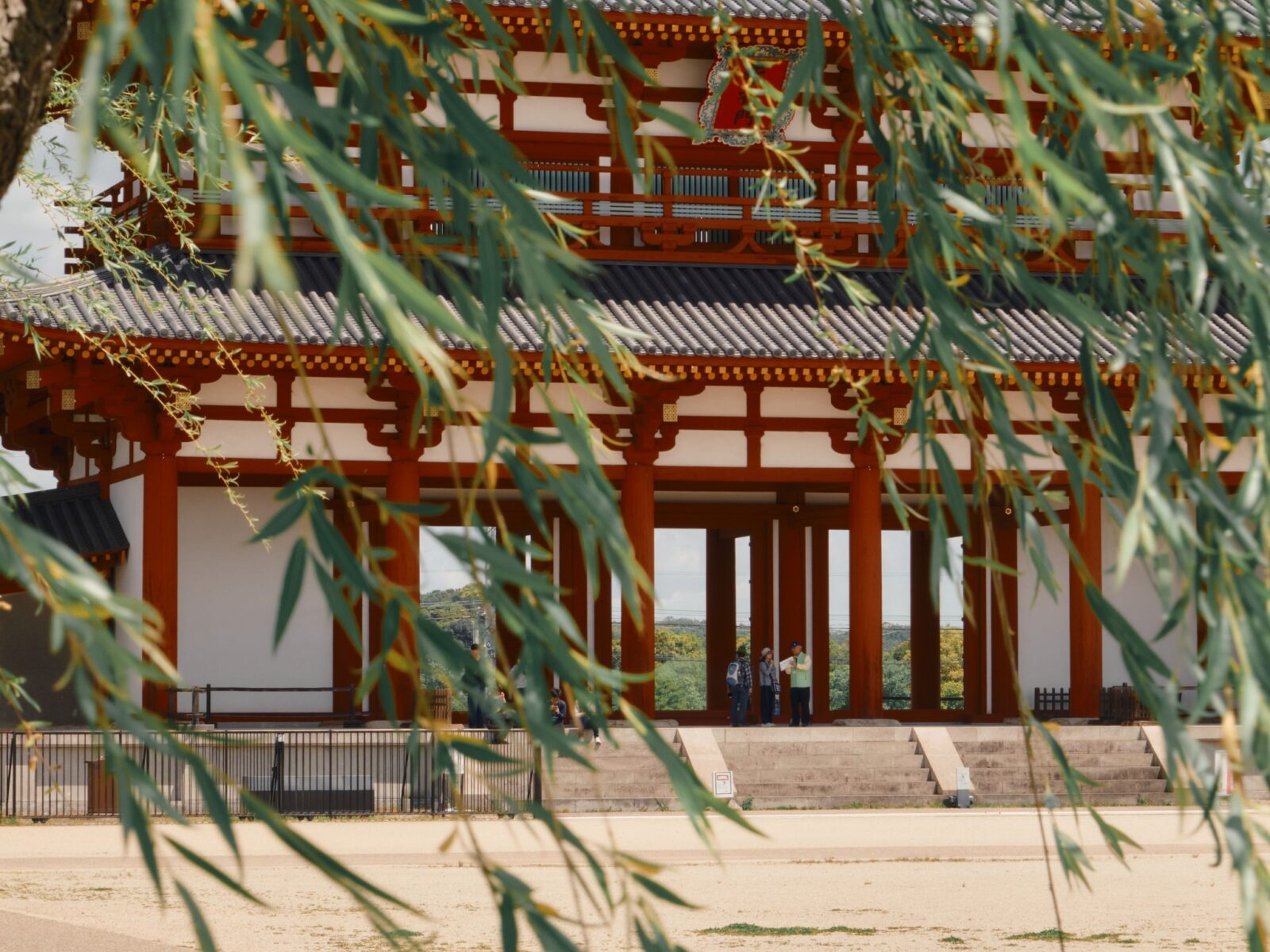 Travelers at a temple in Japan on a Luxury Collection Expedition