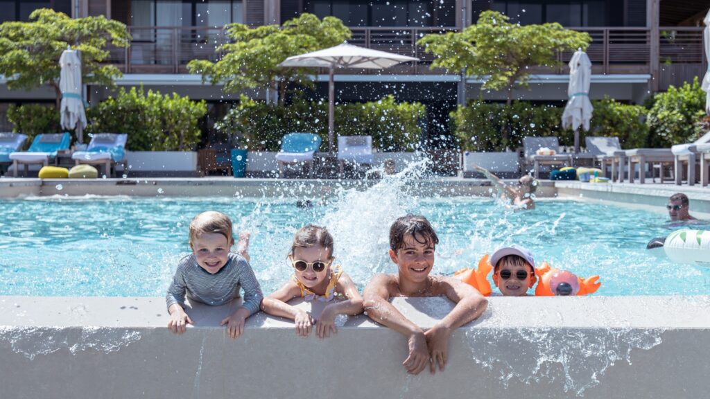 Kids in a pool at Le Barthélemy Hotel & Spa